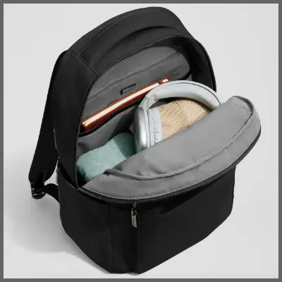 a black backpack with a grey and grey bag inside. Black Friday Travel Deals. Away Black Friday Sale. {Tech} for Travel. https://techfortravel.co.uk