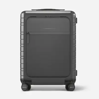 a black suitcase with wheels. Black Friday Travel Deals. Horizn Studios Black Friday Sale. {Tech} for Travel. https://techfortravel.co.uk