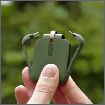 a person holding a green device. Black Friday Travel Deals. Rolling Square Black Friday Sale. {Tech} for Travel. https://techfortravel.co.uk