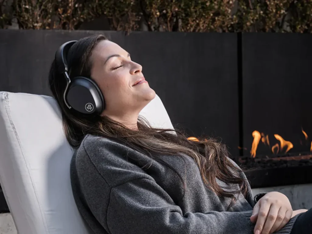 a woman with headphones on. JLab Epic Lux Lab Edition Headphones. {Tech} for Travel. https://techfortravel.co.uk