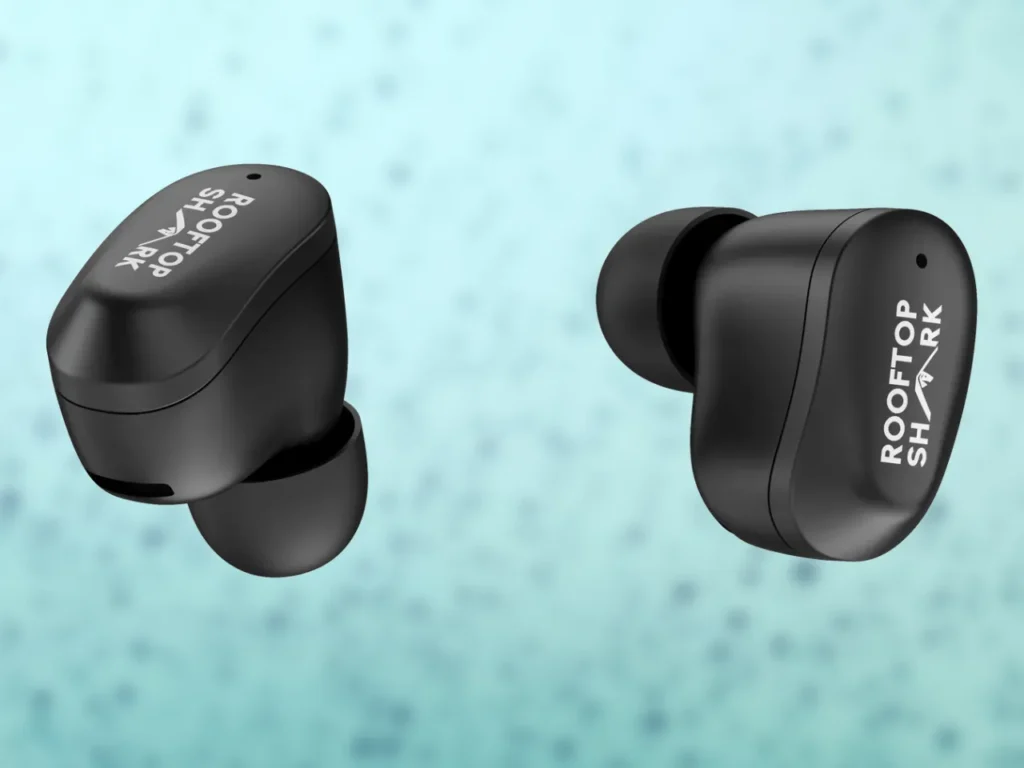 a pair of black earbuds. CES 2025 News. Rooftop Shark AI-10 Smartwatch.  {Tech} for Travel. https://techfortravel.co.uk