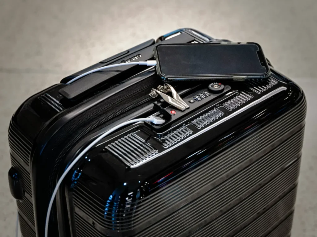 a phone on a suitcase. Carry On suitcase.  {Tech} for Travel. https://techfortravel.co.uk