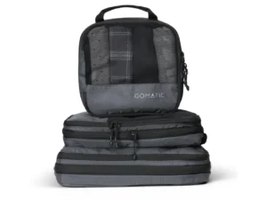 a stack of grey bags. Gomatic Packing Cubes. Nomatic Packing Cubes. {Tech} for Travel. https://techfortravel.co.uk