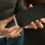 Best of CES 2025 Planck SSD Arrives on Kickstarter a person holding a cell phone