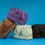 Away Featherlight Weekender is a More Organised, Lighter Upgrade a group of bags stacked on top of each other