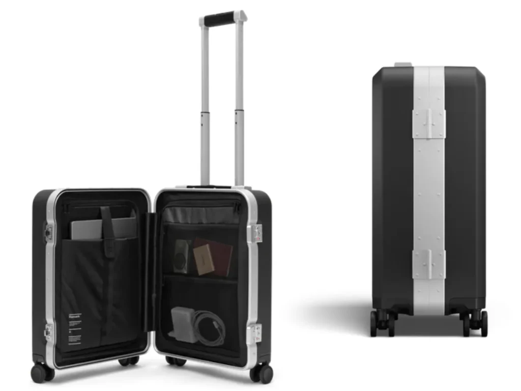 a black and silver suitcase with handle. Db Ramverk Pro Carry-On. Best Carry On Cases 2025. {Tech} for Travel. https://techfortravel.co.uk