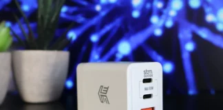 STM Goods 65W Travel Charger Review: A Trusty Charger With Limits a white power outlet with a green plant in front of it. STM Goods 65W Travel Adapter