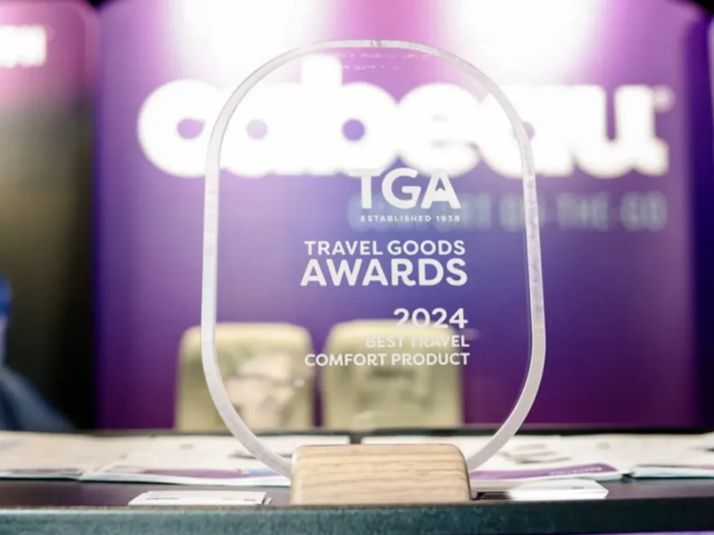 a glass trophy on a table. Travel Goods Show 2025. {Tech} for Travel. https://techfortravel.co.uk