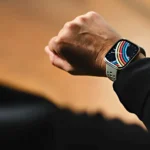 a person wearing a smart watch. AMazfit Bip 6 Smartwatch