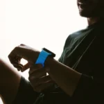 Limited Edition Nomad Rocky Point Band Gets the Glow for Apple Watch a man using a smart watch. Nomad Rocky Point Band. {Tech} for Travel. https://techfortravel.co.uk