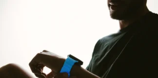 Limited Edition Nomad Rocky Point Band Gets the Glow for Apple Watch a man using a smart watch. Nomad Rocky Point Band. {Tech} for Travel. https://techfortravel.co.uk