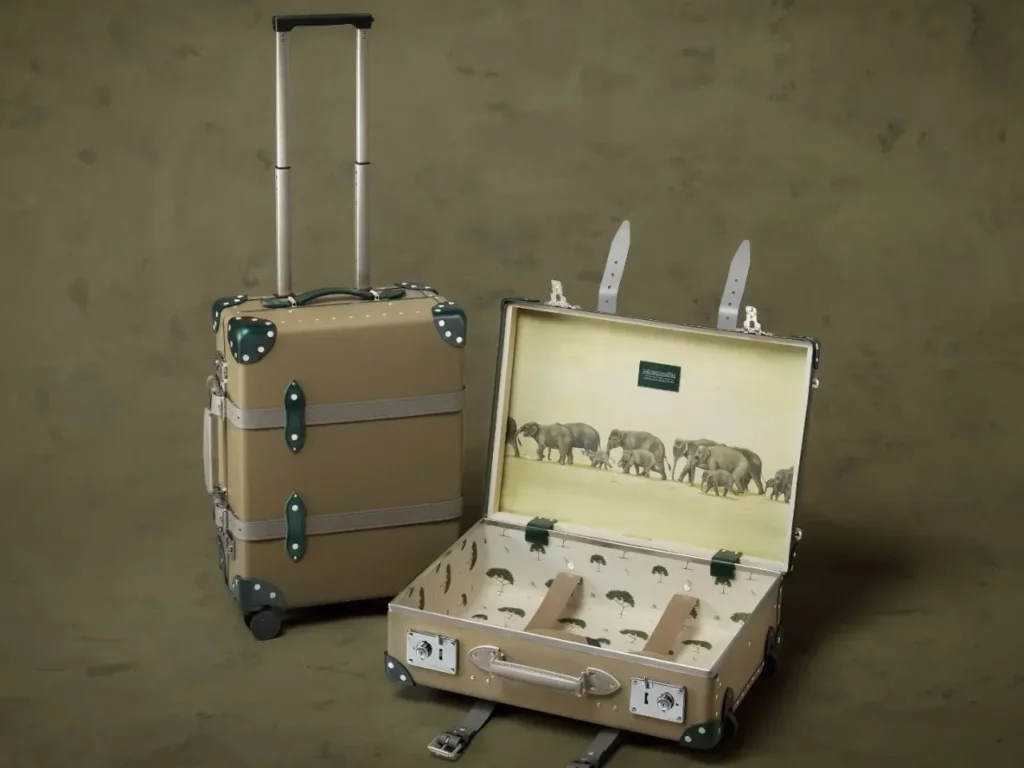 Globe-Trotter Elephant Family Collection Carry-On – {Tech} for Travel a suitcase with a picture of elephants in it. Globe-Trotter Elephant Family collection. {Tech} for Travel. https://techfortravel.co.uk