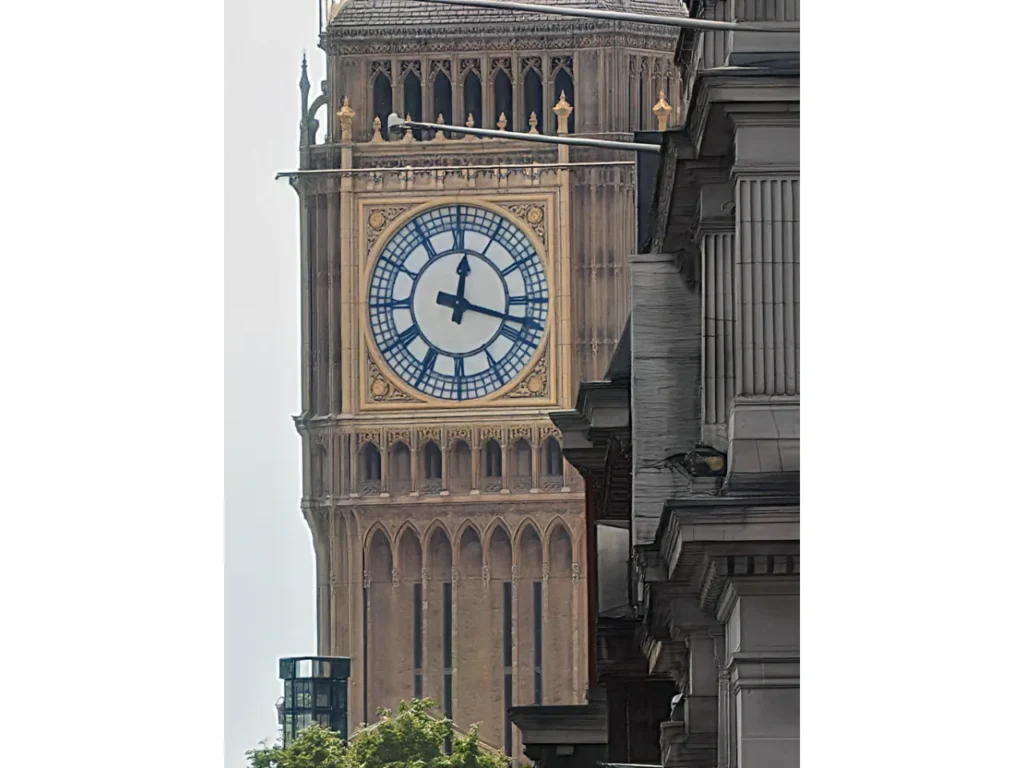 a clock tower with a large clock on it