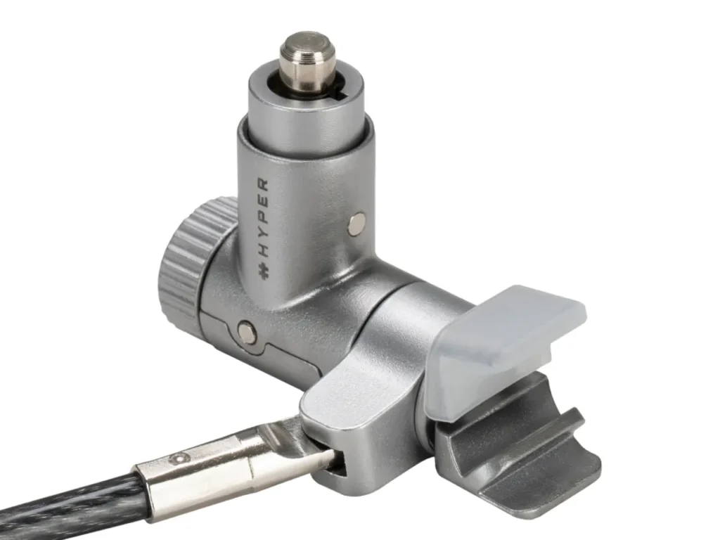 HyperShield MacBook Pro Cable Lock Profile – {Tech} for Travel a silver and black device with a cable. HyperShield MacBook Pro Cable Lock. {Tech} for Travel. https://techfortravel.co.uk