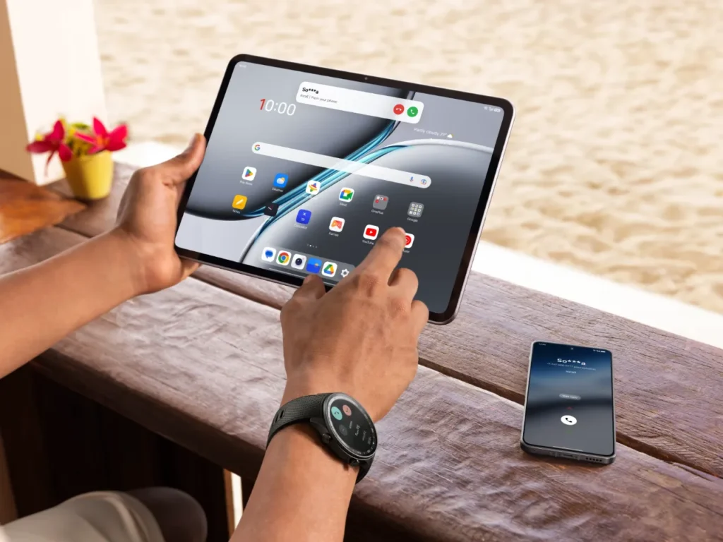 OnePlus Pad 2 – {Tech} for Travel a person holding a tablet and a cell phone. Father's Day Gift Ideas. {Tech} for Travel. https://techfortravel.co.uk
