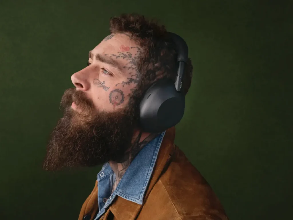 Sony WH-1000XM6 Headphones PM – {Tech} for Travel a man with a beard and tattoos on his face. Sony WH-1000XM6 Headphones. {Tech} for Travel. https://techfortravel.co.uk