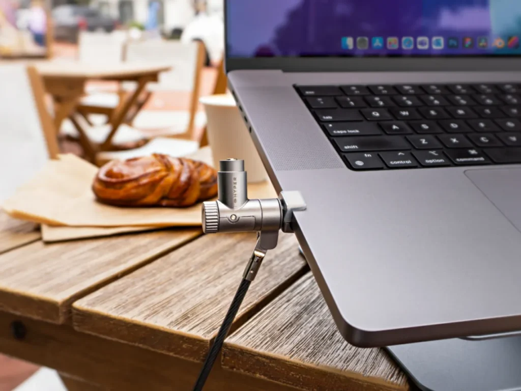 Targus Hyper Hypershield Hero – {Tech} for Travel a laptop with a microphone attached to the back. HyperShield MacBook Pro Cable Lock. {Tech} for Travel. https://techfortravel.co.uk