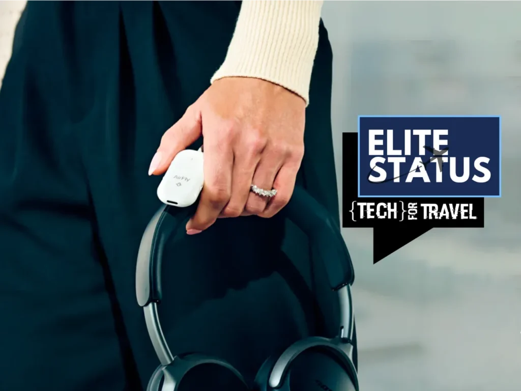 a hand holding a pair of headphones. Twelve South AirFly Pro 2 Review. {Tech} for Travel. https://techfortravel.co.uk