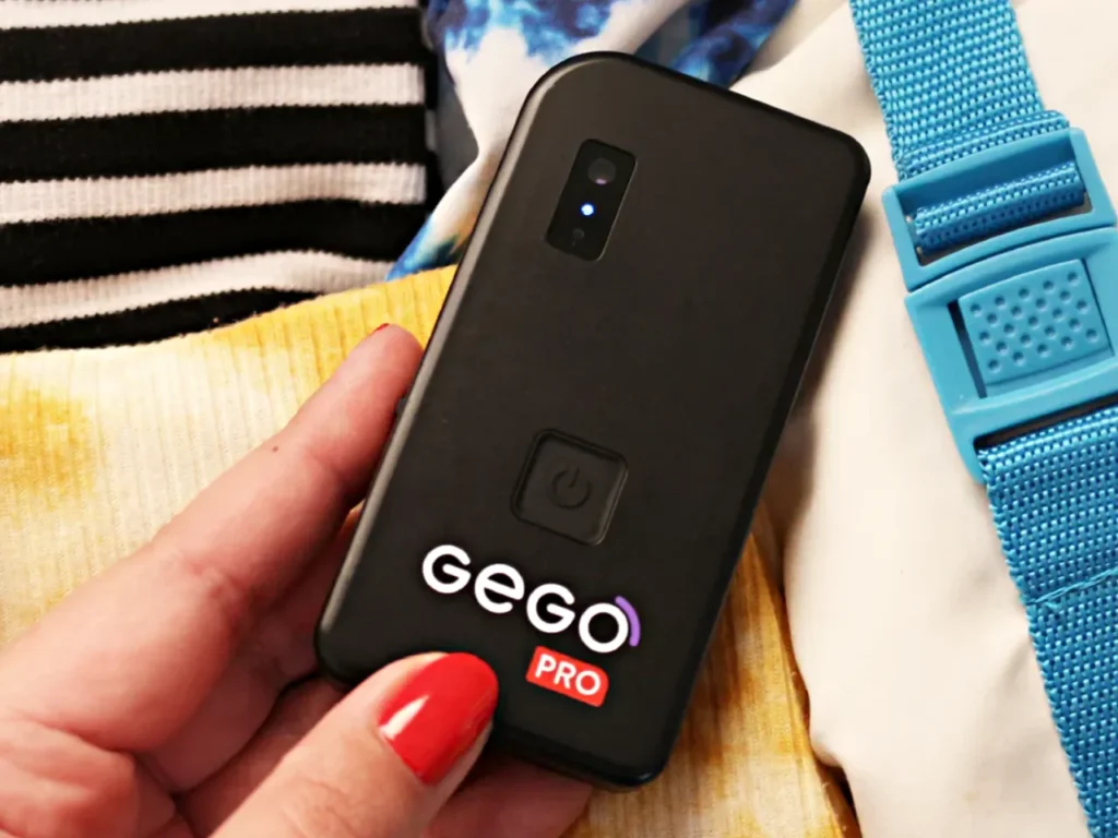 GEGO Pro – {Tech} for Travel a hand holding a cell phone. Best Luggage Tracker. GEGO Pro Tracker. {Tech} for Travel. https://techfortravel.co.uk. Best Luggage Trackers