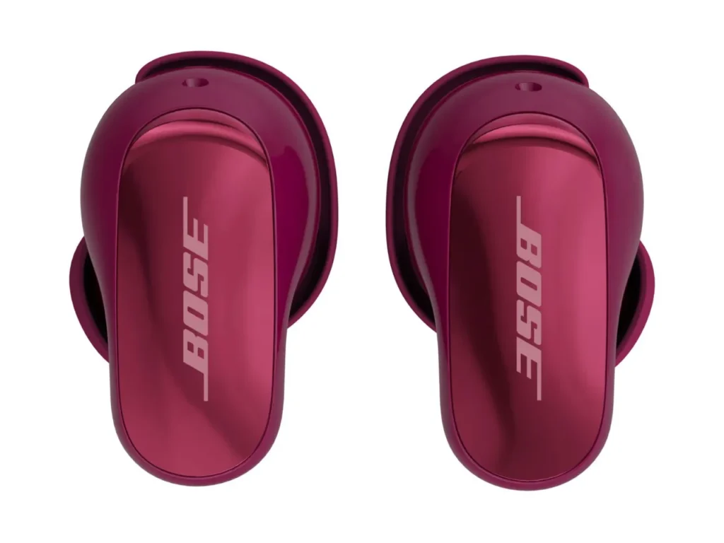QuietComfort Ultra Earbuds 2nd Gen Deep Plum – {Tech} for Travel a pair of red earbuds. Bose QuietComfort Ultra Earbuds 2nd Gen. {Tech} for Travel. https://techfortravel.co.uk