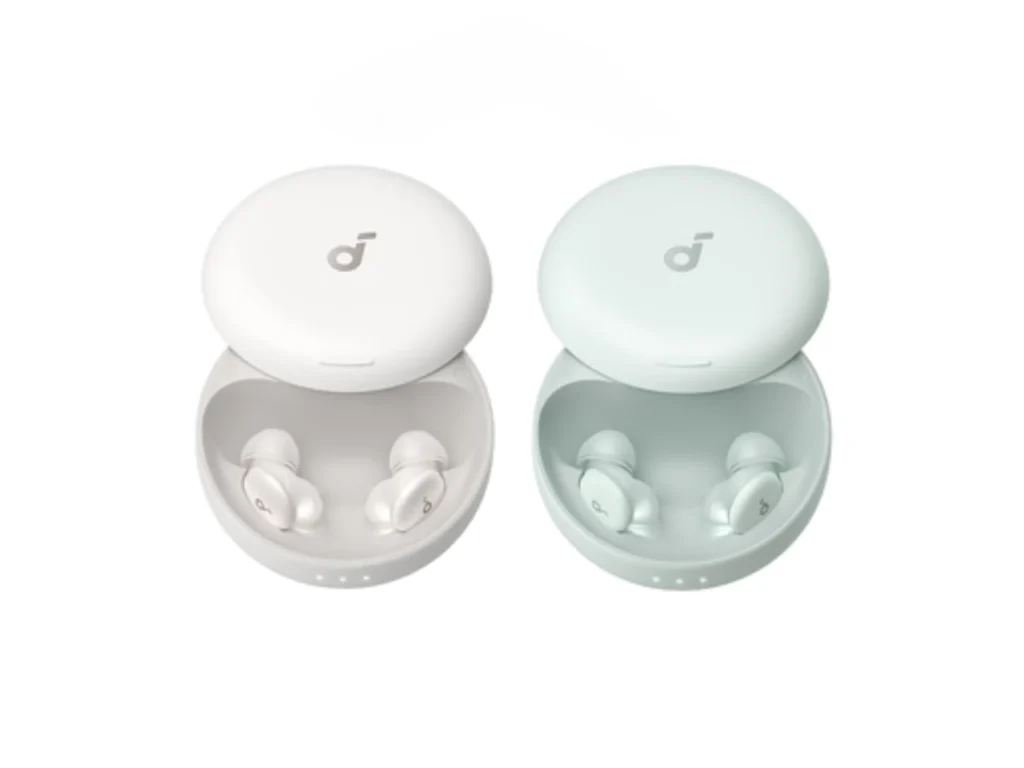 Soundcore Sleep A30 Colours – {Tech} for Travel a pair of white and grey earbuds in a round container. Soundcore Sleep A30. {Tech} for Travel. https://techfortravel.co.uk