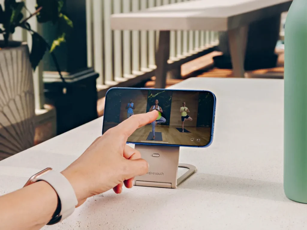 Twelve South Curve Nano Landscape – {Tech} for Travel a person's hand pointing at a screen of a phone. Twelve South Curve Nano. {Tech} for Travel. https://techfortravel.co.uk
