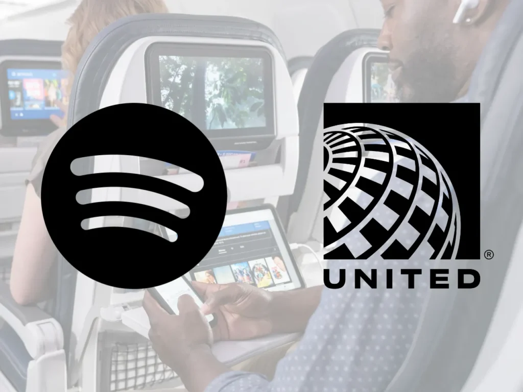 a man using a phone and a logo. United Airlines Spotify. {Tech} for Travel. https://techfortravel.co.uk