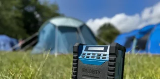 Majority Landbeach Review: High-Quality DAB+ Outdoor Sound a blue speaker in the grass. Majority Landbeach Speaker review. {Tech} for Travel. https://techfortravel.co.uk
