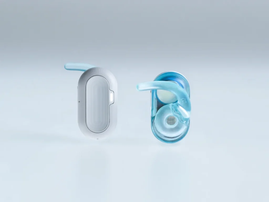 Natura AI HumanPods Close Up – {Tech} for Travel a pair of bluetooth headsets. Natura AI. {Tech} for Travel. https://techfortravel.co.uk