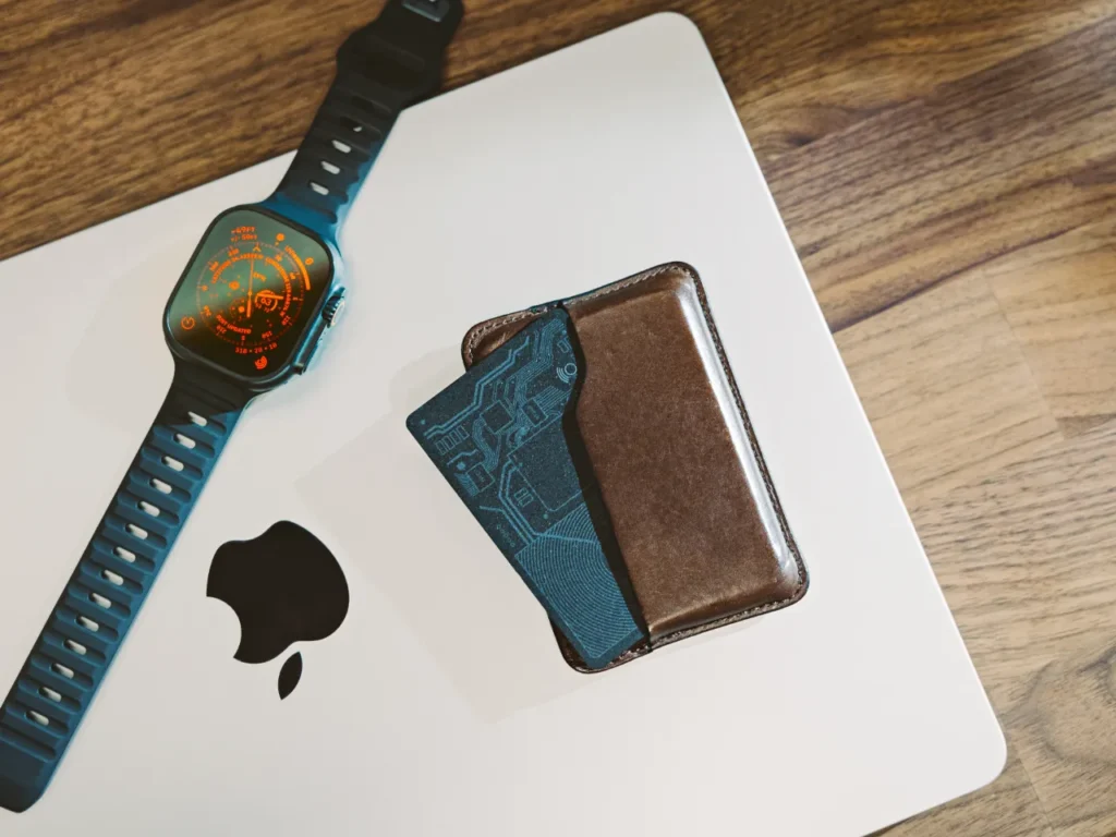 a watch and wallet on a laptop. Nomad Goods 13th Anniversary Sale. {Tech} for Travel. https://techfortravel.co.uk