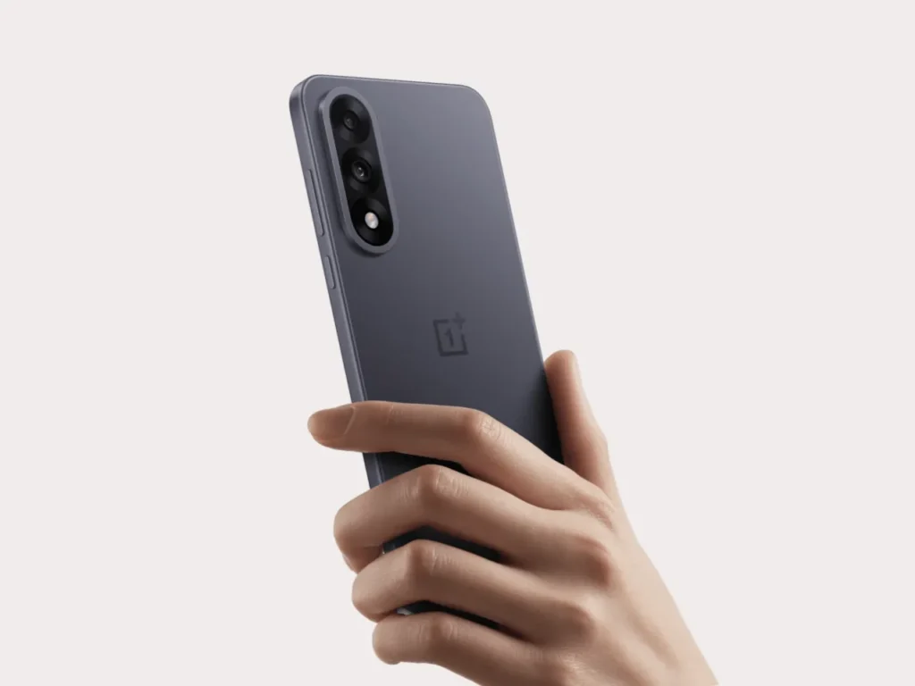 OnePlus Nord 5 In Hand – {Tech} for Travel a hand holding a cell phone. OnePlus Nord 5. {Tech} for Travel. https://techfortravel.co.uk