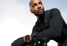a man sitting on a bicycle. OnePlus Watch 3 43mm. {Tech} for Travel. https://techfortravel.co.uk