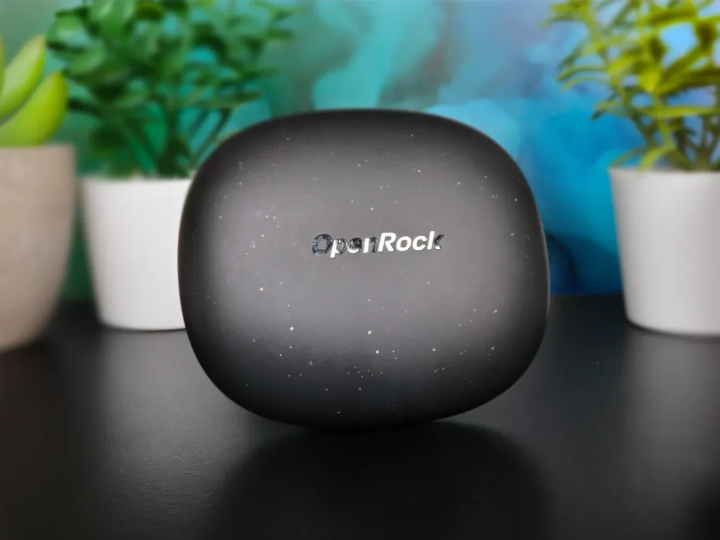 OpenRock S2 Earbuds Case Closed – {Tech} for Travel a black object on a table. OpenRock S2 Earbuds review. {Tech} for Travel. https://techfortravel.co.uk
