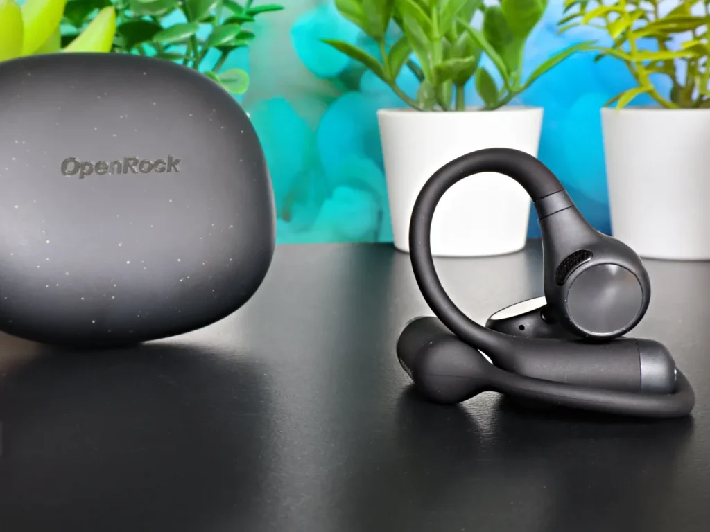OpenRock S2 Earbuds Frame – {Tech} for Travel a black headphones on a black surface. OpenRock S2 Earbuds review. {Tech} for Travel. https://techfortravel.co.uk