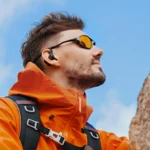 a man wearing sunglasses and a backpack. OpenRock S2 Earbuds review. {Tech} for Travel. https://techfortravel.co.uk