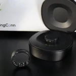 a black round object with a round ring inside. RingConn Gen 2 Review. {Tech} for Travel. https://techfortravel.co.uk