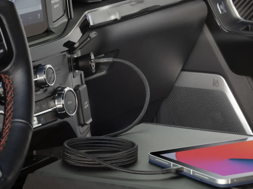 Scosche FoundIt Charger in use – {Tech} for Travel a phone plugged into a car. Scosche FoundIT car charger . {Tech} for Travel. https://techfortravel.co.uk
