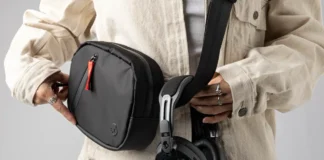 THX Audio Powers Skullcandy Aviator 900 Headphones a person holding a bag with headphones around their waist. Skullcandy Aviator 900 Headphones. {Tech} for Travel. https://techfortravel.co.uk
