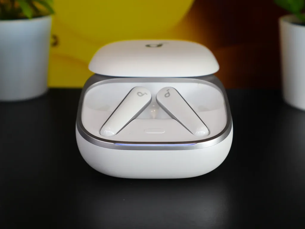 Soundcore Liberty 5 Earbuds Open Case – {Tech} for Travel a white wireless earbuds in a case. Soundcore Liberty 5 review. {Tech} for Travel. https://techfortravel.co.uk