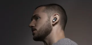 IFA 2025: Debut for Status Audio Pro X Earbuds a man wearing a grey sweater. IFA 2025 news. Status Pro X Earbuds. {Tech} for Travel. https://techfortravel.co.uk