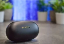 TOZO Golden X1 Review: Small Earbuds, Huge Sound Performance a black oval object on a table. TOZO Golden X1 Earbuds Review. {Tech} for Travel. https://techfortravel.co.uk