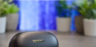 TOZO Golden X1 Review: Small Earbuds, Huge Sound Performance a black oval object on a table. TOZO Golden X1 Earbuds Review. {Tech} for Travel. https://techfortravel.co.uk