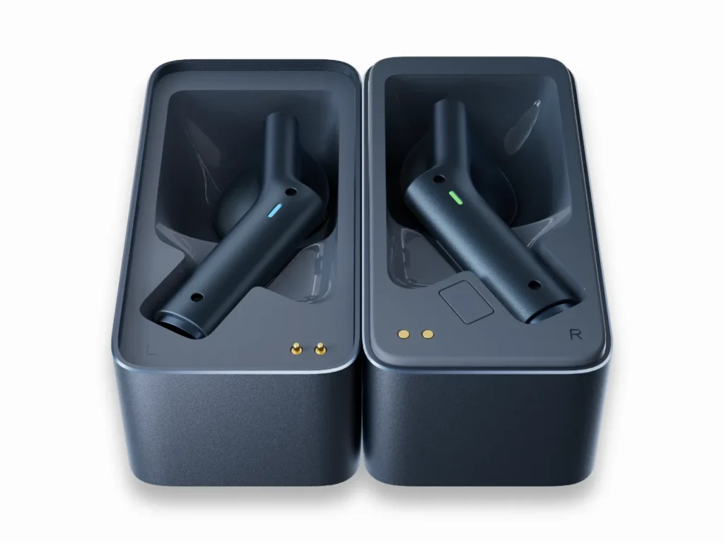 Timekettle W4 AI Translator Earbuds Navy Blue – {Tech} for Travel two black rectangular objects with a green light. Timekettle W4 AI Translator Earbuds. {Tech} for Travel. https://techfortravel.co.uk