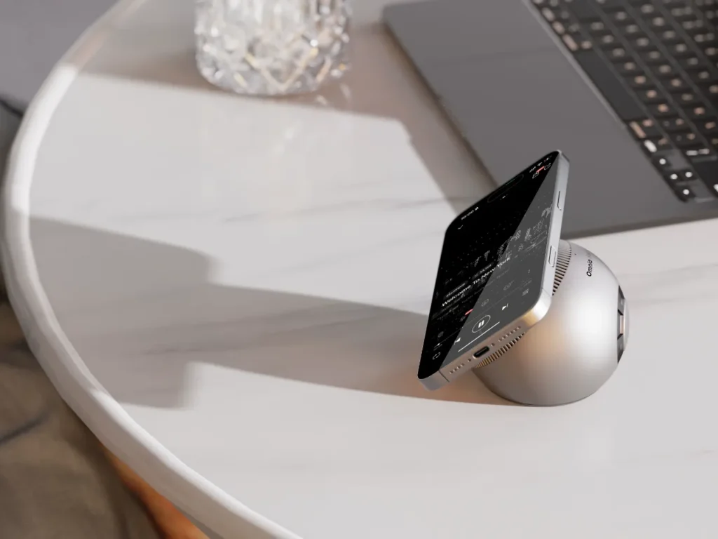 a phone on a wireless speaker. AUKEY MagFusion Ark. IFA 2025 news. {Tech} for Travel. https://techfortravel.co.uk