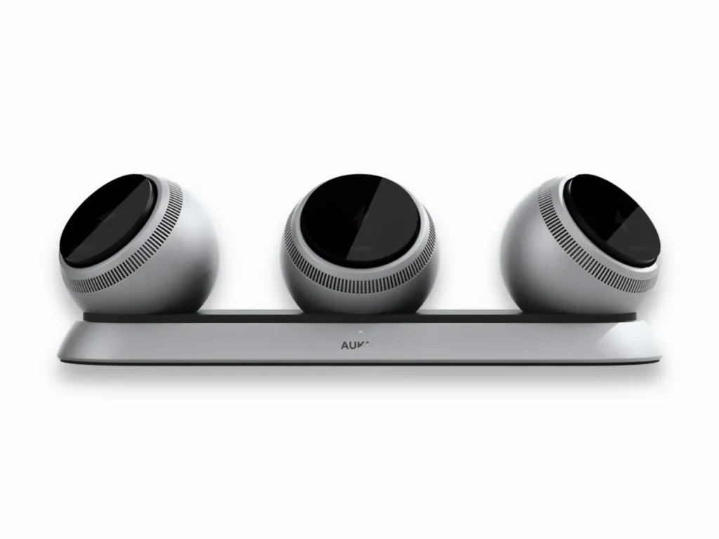 a three round silver objects on a white background. AUKEY MagFusion Ark. IFA 2025 news. {Tech} for Travel. https://techfortravel.co.uk