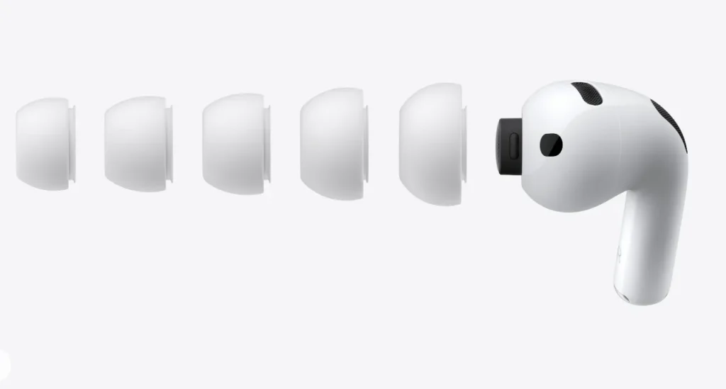 a white object with a black circle. Apple AirPods Pro 3. {Tech} for Travel. https://techfortravel.co.uk