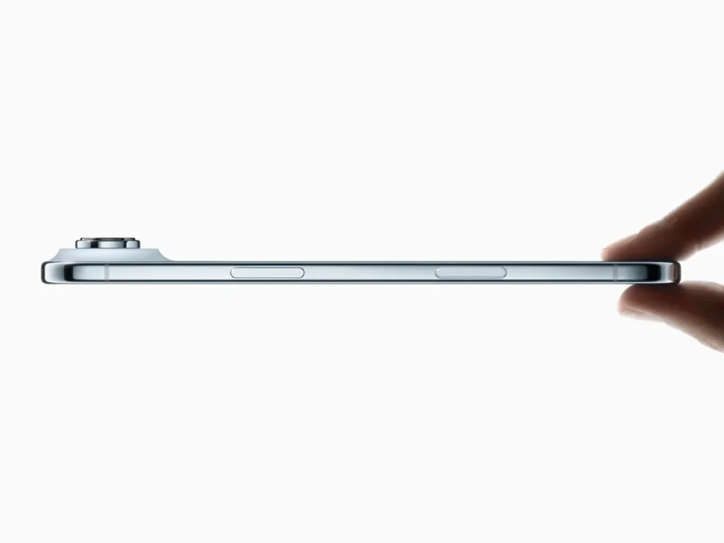 a hand holding a silver smartphone. Apple iPhone Air. {Tech} for Travel. https://techfortravel.co.uk