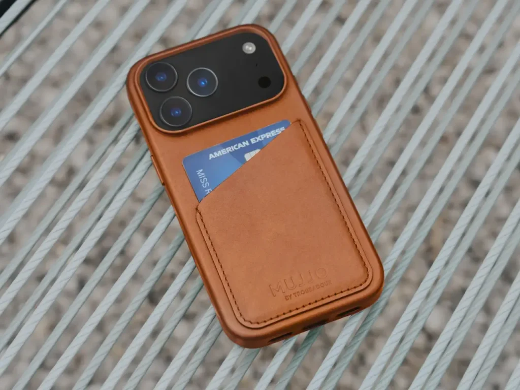 Mujjo Full Leather Wallet Case iPhone 17 – {Tech} for Travel a phone with a card in it. Best Apple iPhone 17 Cases. Apple iPhone 17 Pro Cases. Apple iPhone 17 Pro Max Cases. {Tech} for Travel. https://techfortravel.co.uk