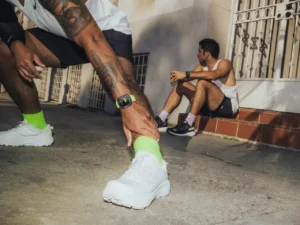 a pair of men sitting on steps. Nomad Tempo Band. {Tech} for Travel. https://techfortravel.co.uk