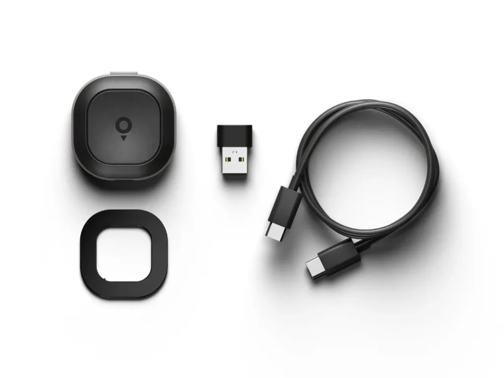 a black electronic device with a cable. TomTom app. speed camera warning device. Tom by TomTom. {Tech} for Travel. https://techfortravel.co.uk
